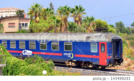 Cefal, Italy. August 24, 2026. An Intercity Notte long-distance train connecting cities such as Milan and Rome with Sicily or Puglia. The "Comfort" carriage, featuring couchette-style sleeping berths, Cefal, Italy. August 24, 2026. An Intercity Notte long-distance train connecting cities such as Milan and Rome with Sicily or Puglia. The "Comfort" carriage, featuring couchette-style sleeping berths, 143499281
