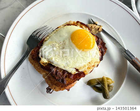 Classic French croque madame served for breakfast. Classic French croque madame served for breakfast. 143501364