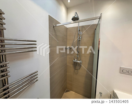 Contemporary bathroom shower with rainfall showerhead. 143501405