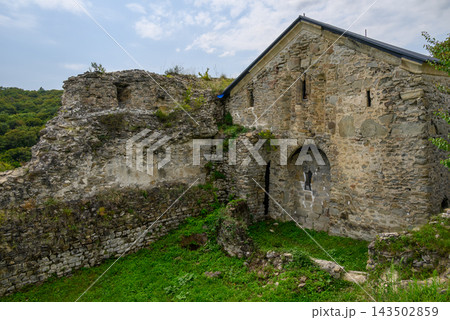Ujarma Fortress, ancient medieval fortress city in eastern Georgia, dramatically perched on a rocky hill overlooking the Iori River Ujarma Fortress, ancient medieval fortress city in eastern Georgia, dramatically perched on a rocky hill overlooking the Iori River 143502859