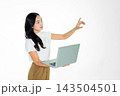 Asian Girl Holding Laptop and Pointing on White Background Asian Girl Holding Laptop and Pointing on White Background 143504501