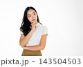 Thoughtful Young Asian Girl Posing Against White Background with Hand on Chin in Casual Outfit Thoughtful Young Asian Girl Posing Against White Background with Hand on Chin in Casual Outfit 143504503