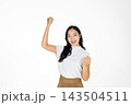 Excited Asian Girl Celebrating Victory with Raised Fist on White Background Excited Asian Girl Celebrating Victory with Raised Fist on White Background 143504511