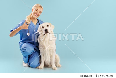 Smiling Caucasian Female Veterinarian Posing With Friendly Dog In Animal Clinic Setting, Exuding Joy And Care. Bonding Moment In Professional Environment Focused On Pet Health, Healthcare Concept. 143507086