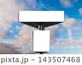 Front view: two blank white billboards against the blue sky with clouds: mock up 143507468