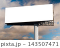 Mock up: blank wide white billboard against the blue sky with white clouds 143507471
