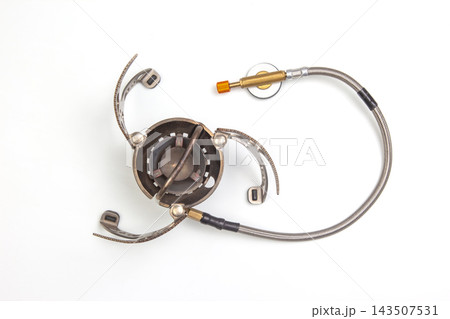 Basic camping stove on white background ready for outdoor cooking Basic camping stove on white background ready for outdoor cooking 143507531