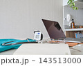 Remote medical consultation setup with laptop and stethoscope 143513000
