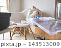 Cozy home workspace ready for hobby crafting activities 143513009