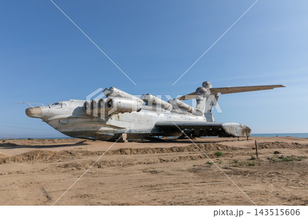 Abandoned Soviet Lun-class ekranoplan sitting on Caspian Sea beach in Derbent Abandoned Soviet Lun-class ekranoplan sitting on Caspian Sea beach in Derbent 143515606