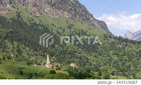 Ancient stone watchtowers standing in the mountain valley of Khamkhi 143515687