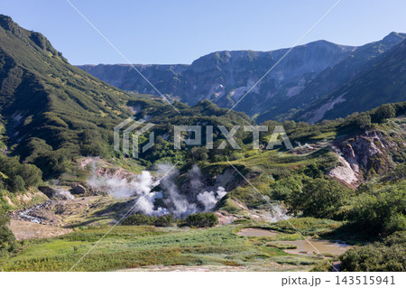 Geothermal steam rising over the Valley of Geysers canyon 143515941