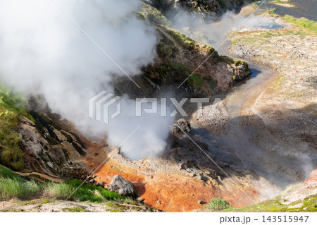 Geothermal steam erupting from hot springs at Valley of Geysers in nature Geothermal steam erupting from hot springs at Valley of Geysers in nature 143515947