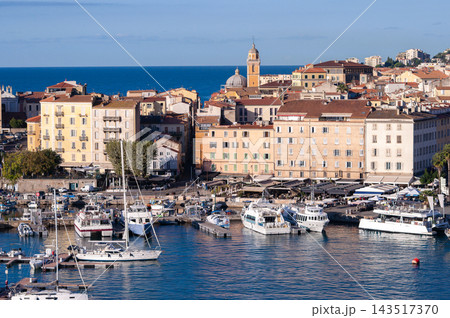 Yachts in the port at the old town of Ajaccio, Corsica. Ajaccio is the capital and largest city of Corsica island, a French commune Yachts in the port at the old town of Ajaccio, Corsica. Ajaccio is the capital and largest city of Corsica island, a French commune 143517370