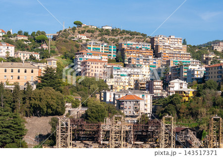 Savona, Italy with port and hillside buildings, panoramic coastal view Savona, Italy with port and hillside buildings, panoramic coastal view 143517371