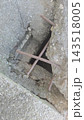 Damaged concrete asphalt texture with rebar exposed 143518005