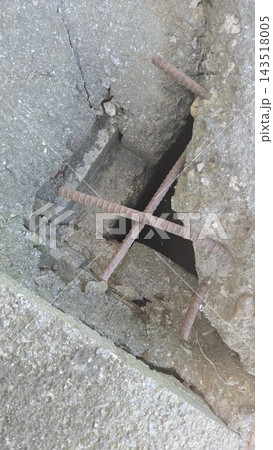 Damaged concrete asphalt texture with rebar exposed Damaged concrete asphalt texture with rebar exposed 143518005