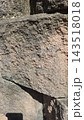 Rough textured ancient stone wall surface close up 143518018