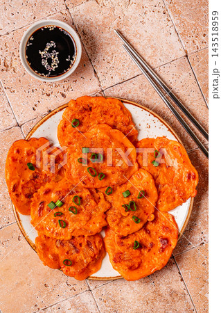 Freshly cooked savory korean pancakes kimchi jeon. Freshly cooked savory korean pancakes kimchi jeon. 143518959