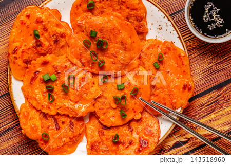 Freshly cooked savory korean pancakes kimchi jeon. Freshly cooked savory korean pancakes kimchi jeon. 143518960
