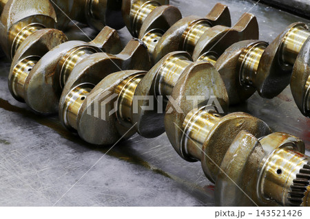 mechanical and engineering concept.. New engine crankshaft. mechanical and engineering concept.. New engine crankshaft. 143521426