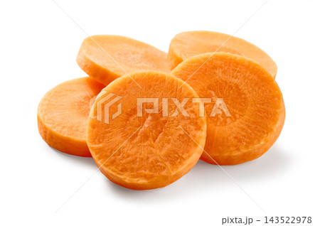 carrot slices fresh raw and round isolated on white carrot slices fresh raw and round isolated on white 143522978