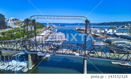 Aerial Tacoma Drawbridge Harbor and Boats Overlooking Waterfront Industry Aerial Tacoma Drawbridge Harbor and Boats Overlooking Waterfront Industry 143532326