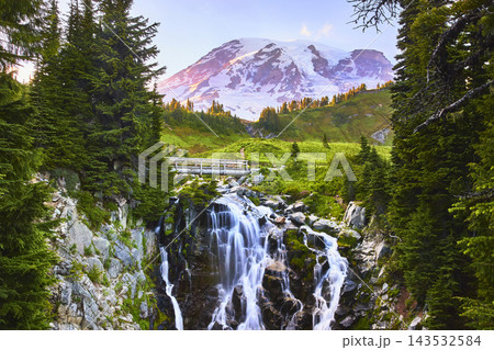 Mount Rainier Myrtle Falls Waterfall and Bridge Framed by Evergreen Trees 143532584