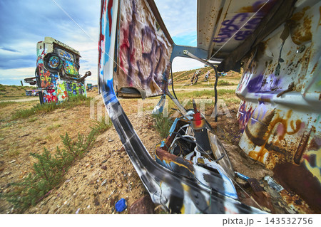 Graffiti Covered Abandoned Vehicles in International Car Forest Nevada Desert Graffiti Covered Abandoned Vehicles in International Car Forest Nevada Desert 143532756