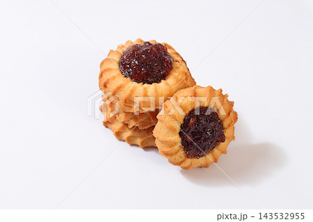 Freshly baked homemade shortbread cookies with jam and preserves, isolated on a light background, concept representing a modern bakery and grain based products. cafe or restaurant menu 143532955