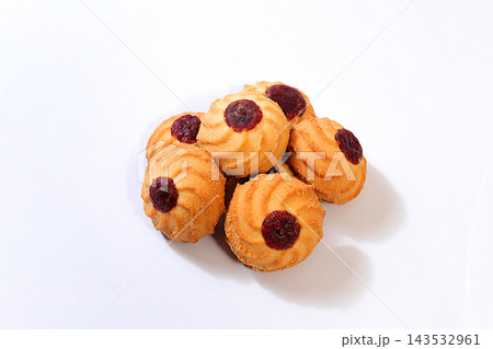 Freshly baked homemade shortbread cookies with jam and preserves, isolated on a light background, concept representing a modern bakery and grain based products. cafe or restaurant menu Freshly baked homemade shortbread cookies with jam and preserves, isolated on a light background, concept representing a modern bakery and grain based products. cafe or restaurant menu 143532961