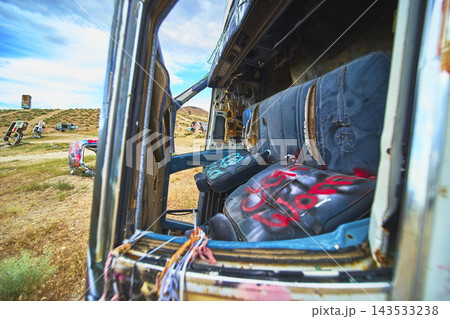 Abandoned Vehicle Interior and Graffiti Art at International Car Forest Nevada 143533238