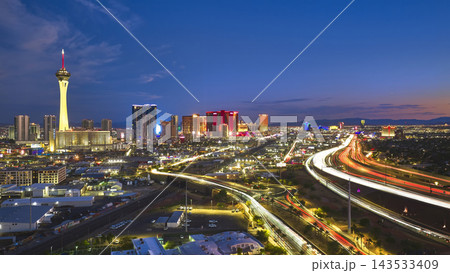 Aerial Las Vegas Strip Stratosphere Tower and Car Trails Blue Hour 143533409
