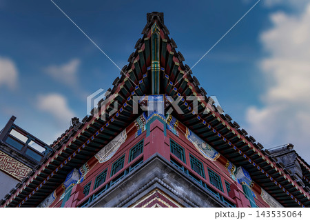 Ornate Corner Eaves of a Traditional Chinese Palace Roof in Beijing 143535064