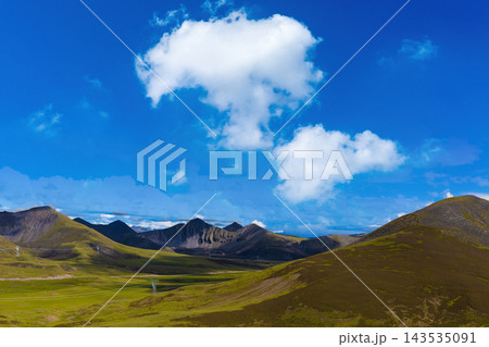 Tibetan Plateau Landscape with Green Hills and Blue Sky Tibetan Plateau Landscape with Green Hills and Blue Sky 143535091