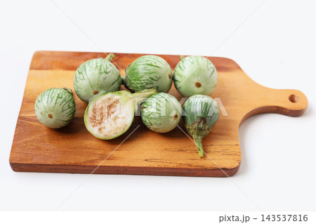 Fresh green Thai eggplants for cooking Fresh green Thai eggplants for cooking 143537816