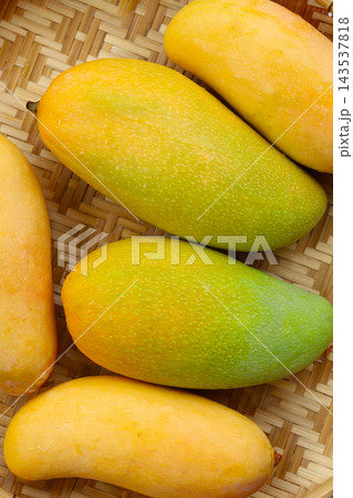 Fresh ripe yellow mangoes, delicious and sweet tropical fruits. Fresh ripe yellow mangoes, delicious and sweet tropical fruits. 143537818