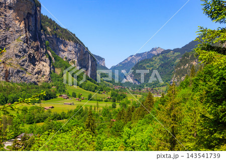 View of Lauterbrunnen Valley in Bernese Oberland, Switzerland. Switzerland nature and travel. Alpine scenery View of Lauterbrunnen Valley in Bernese Oberland, Switzerland. Switzerland nature and travel. Alpine scenery 143541739