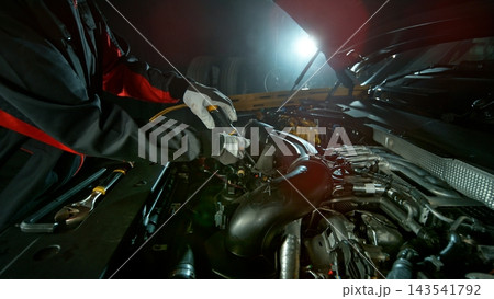 Mechanical Repairing Car Engine , Close-up, Slow Motion. Filmed on High Speed Cinema Camera Mechanical Repairing Car Engine , Close-up, Slow Motion. Filmed on High Speed Cinema Camera 143541792