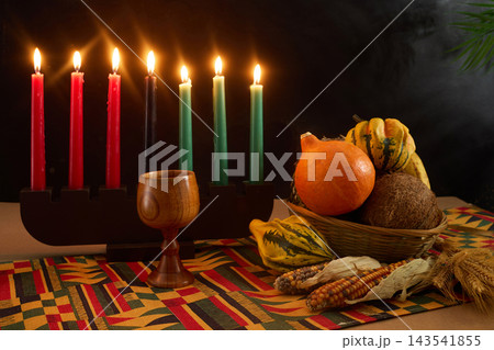 Kwanzaa kinara seven candles and harvest celebrating african american heritage Kwanzaa kinara seven candles and harvest celebrating african american heritage 143541855