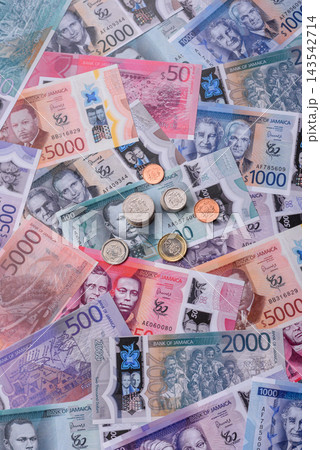 Jamaica, Jamaican paper money, dollar banknotes and cent coins for exchange. Jamaica money Jamaica, Jamaican paper money, dollar banknotes and cent coins for exchange. Jamaica money 143542714