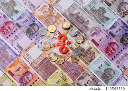 The percentage sign on cash as a concept for inflation or tax liabilities. The percentage sign The percentage sign on cash as a concept for inflation or tax liabilities. The percentage sign 143542780