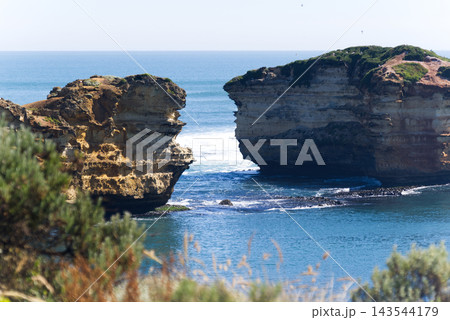 Limestone Rock Formations and Ocean Channel at Bay of Martyrs, Great Ocean Road, Victoria, Australia Limestone Rock Formations and Ocean Channel at Bay of Martyrs, Great Ocean Road, Victoria, Australia 143544179