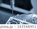 Quality control process by CMM touching probe measuring aluminum automotive parts in a blue tone scene 143548951