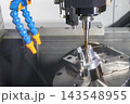High precision metal parts cutting process on a 5-axis CNC milling machine with a ball nose end mill 143548955