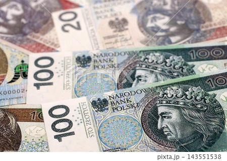 Big amount of polish zloty money bills banknotes close up. Huge pile of cash of Poland currency Big amount of polish zloty money bills banknotes close up. Huge pile of cash of Poland currency 143551538