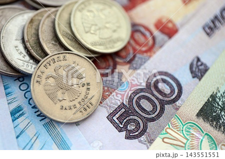Coins and banknotes of Russian Federation ruble currency. Russia RUB money close up. Business Coins and banknotes of Russian Federation ruble currency. Russia RUB money close up. Business 143551551