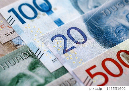Swedish krona paper banknotes pile on table. Sweden SEK currency money bills in big amount 143551602