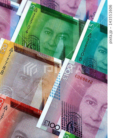 Gibraltar pound paper banknotes pile on table. Gibraltar GIP currency money bills in big amount Gibraltar pound paper banknotes pile on table. Gibraltar GIP currency money bills in big amount 143551606