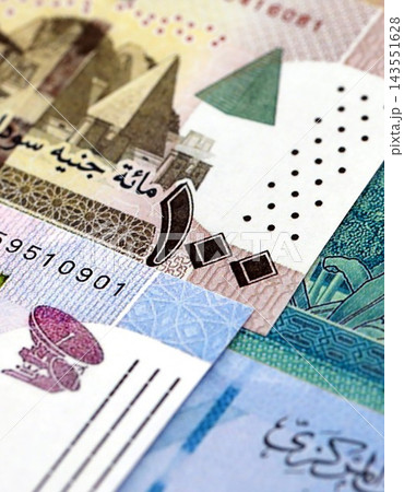 Sudanese pound paper banknotes pile on table. Sudan SDG currency money bills in big amount 143551628